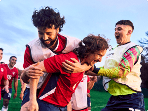 Players celebrating on the pitch